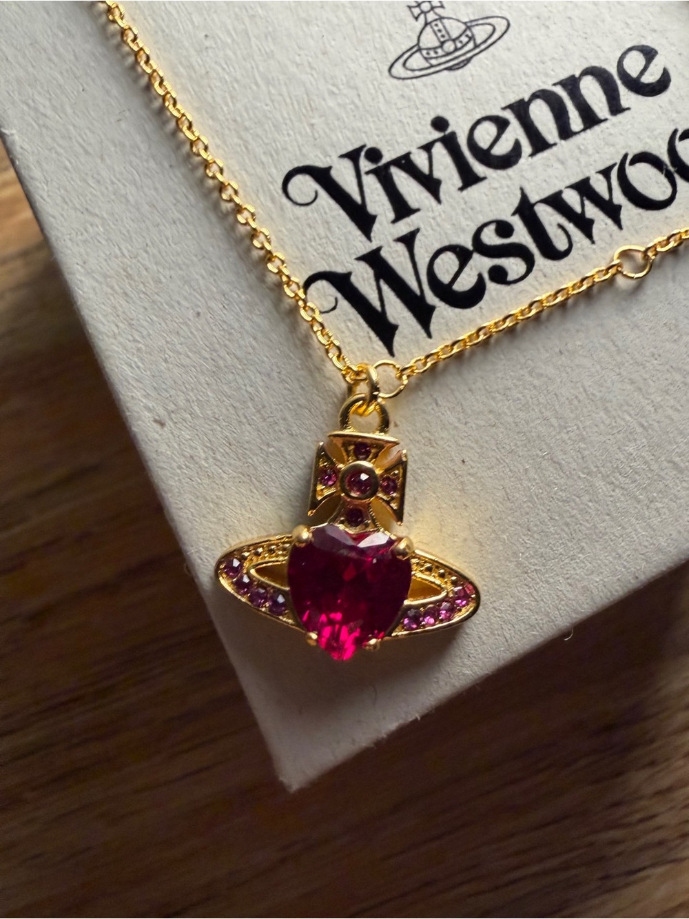 Ariella Vivienne Westwood Gold-tone Heart Orb Necklace with Pink Gem